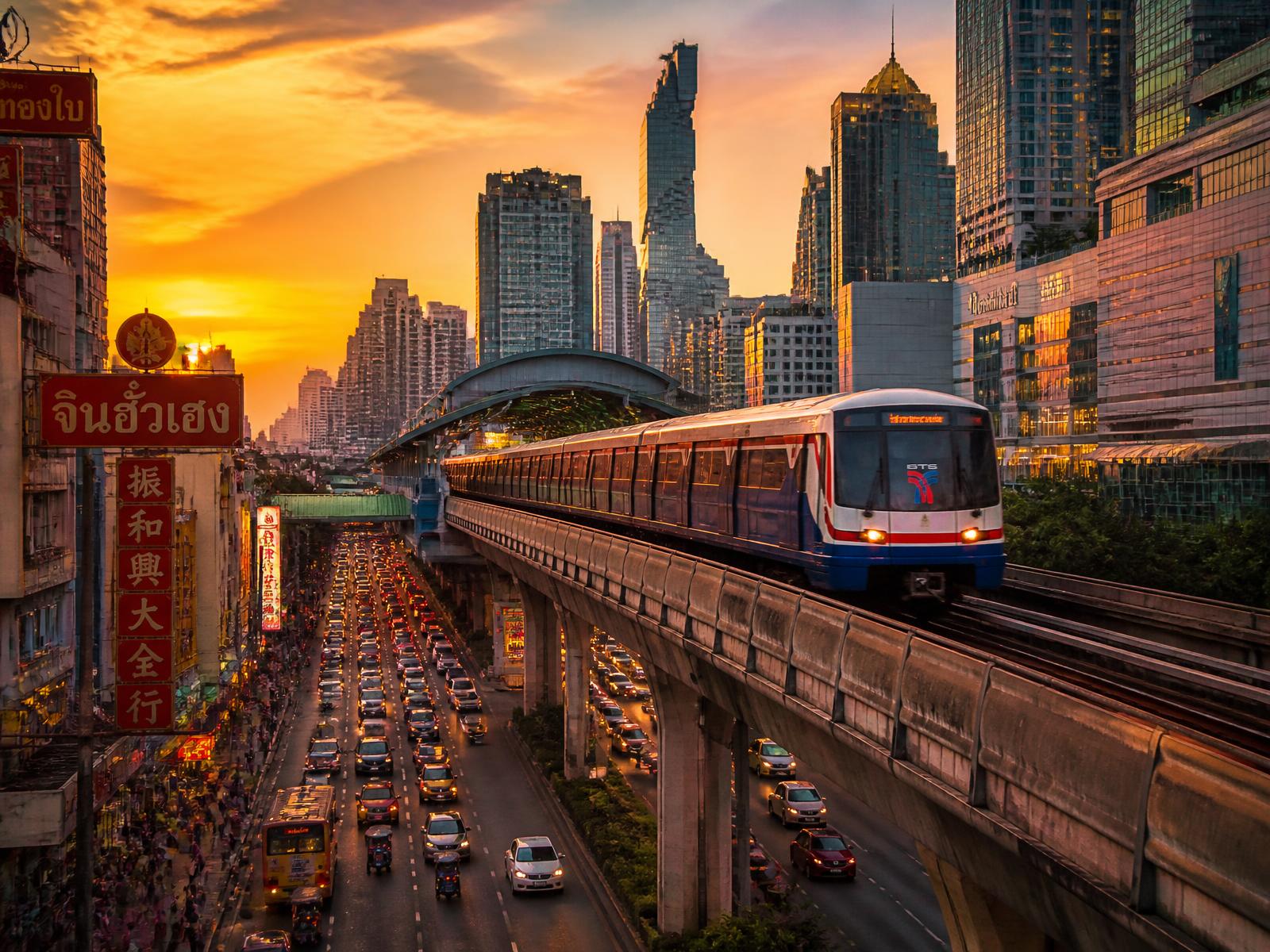 Aeroplane approaching Bangkok at sunset